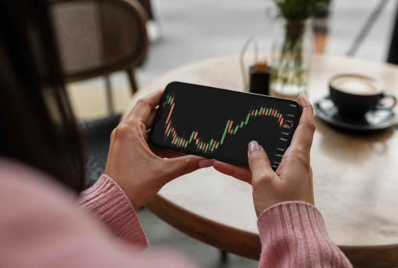 Gráfico de mercado no celular de um trader iniciante